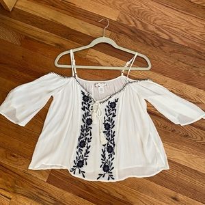 White off-the-shoulder flowy top